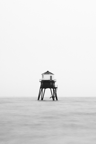 Foggy Lighthouse Wallpaper